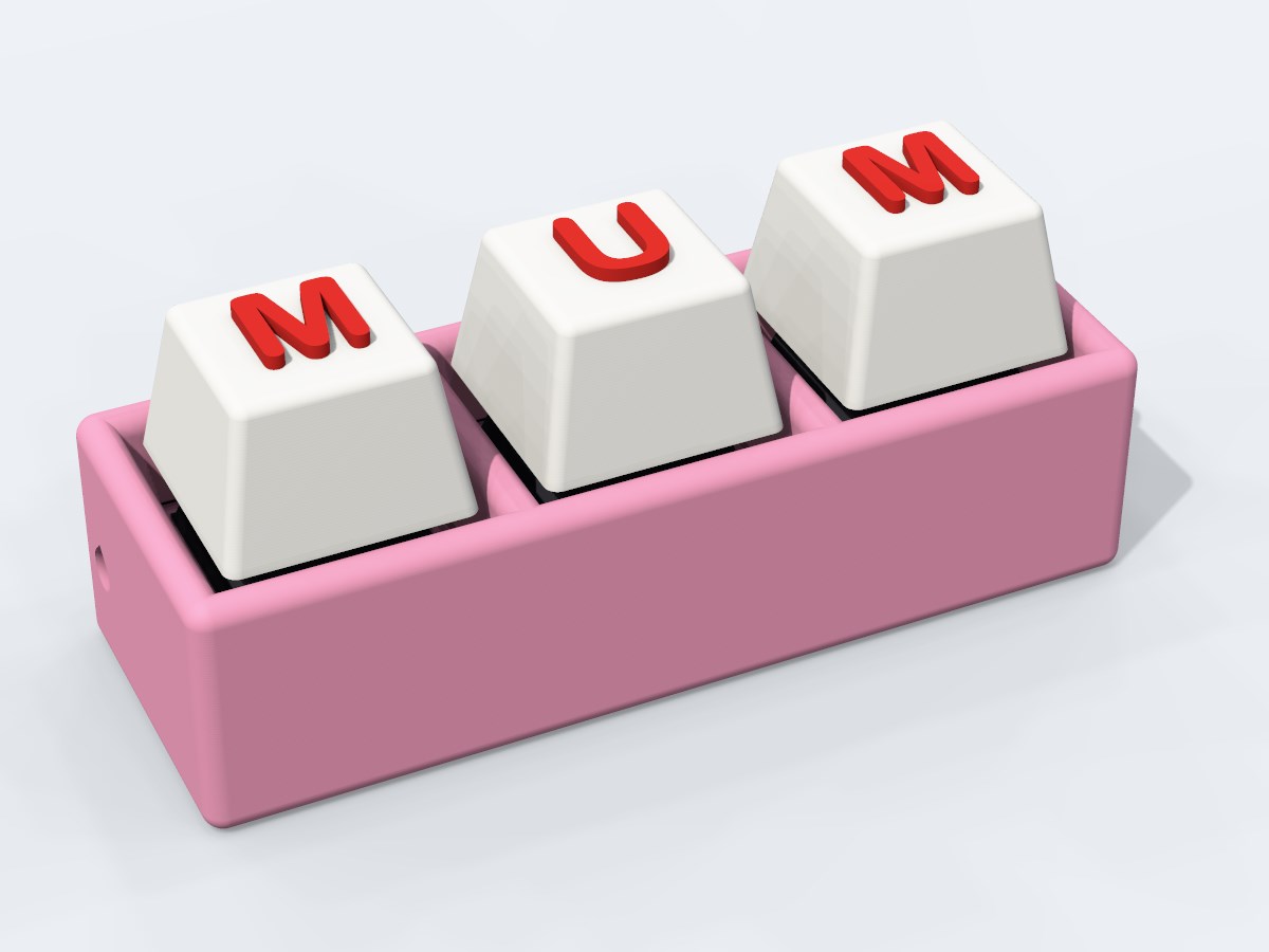Triple clicker, pink body, white caps spelling MUM in red