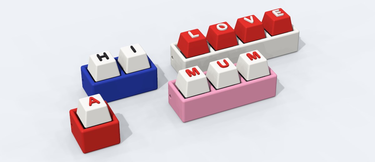 Four keyboard clickers in different colours spelling A, HI, MUM and LOVE, from the 1-key Single to the 4-key Quad